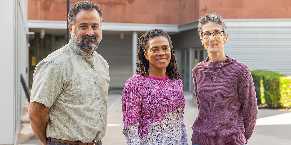 Dr. Porter standing next to Dr. Foster and Dr. Aguilar