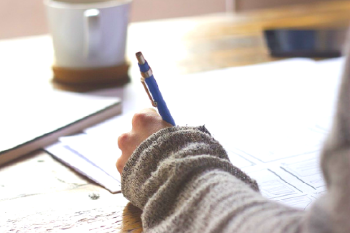 Close up of someone writing